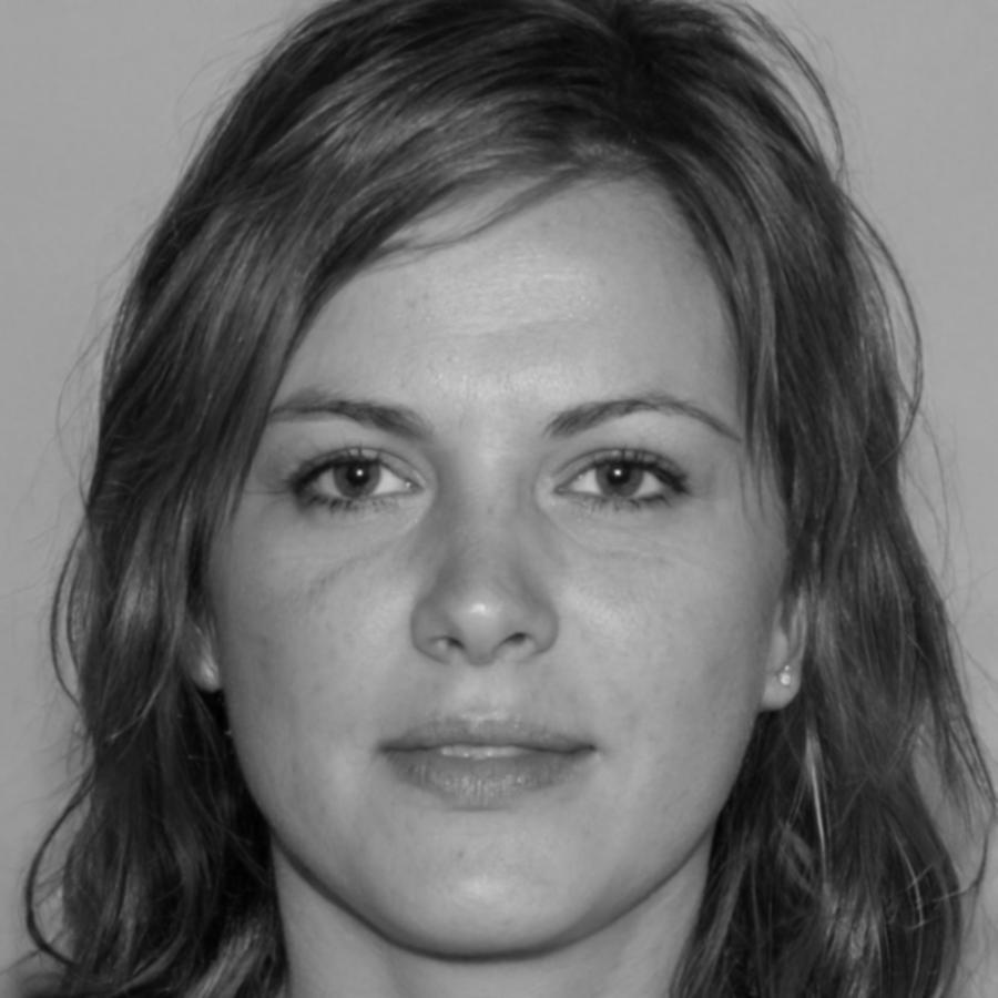 Professional headshot of business owner